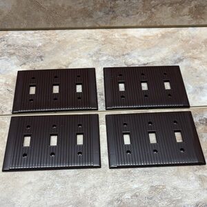 Reliance 3-gang 1950s ribbed brown bakelite switch plate wall box cover